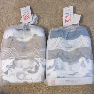 2 Packs of 4 Carter’s Onesies
